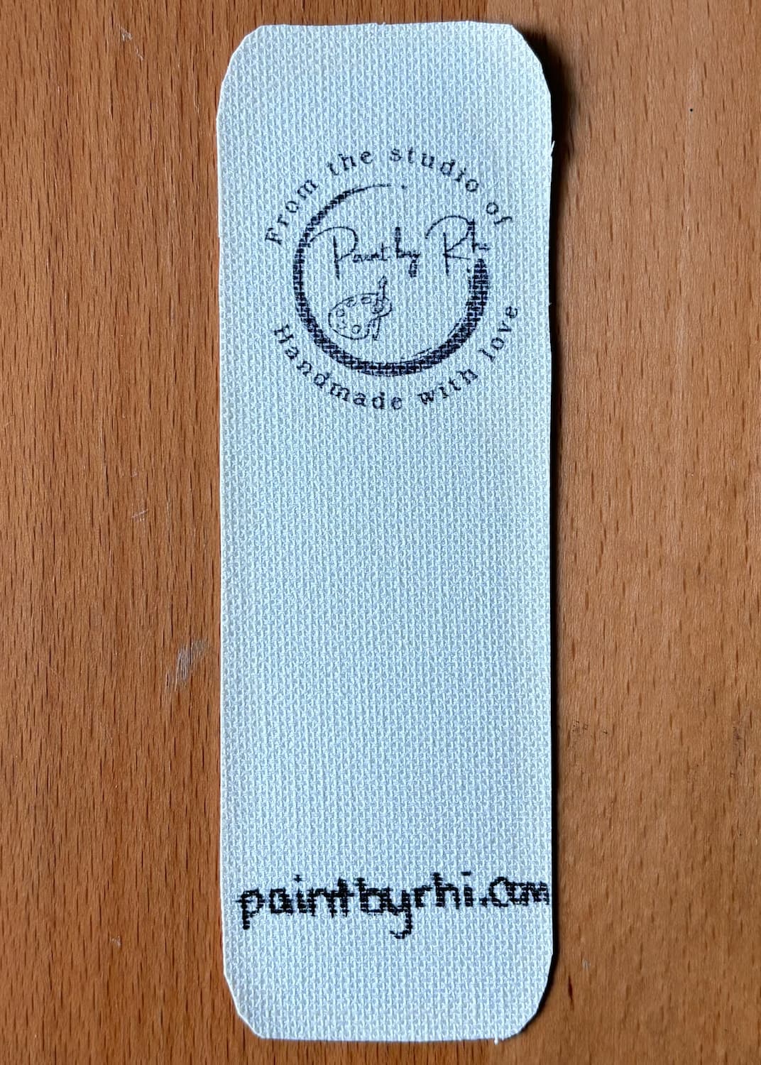 As You Like It bookmark, back with studio stamp
