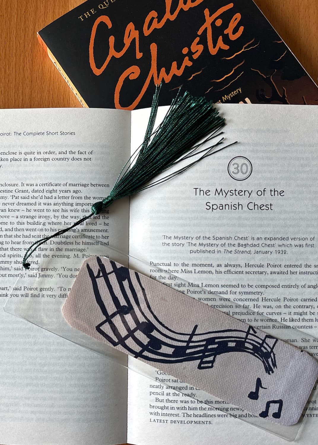 Twelfth Night bookmark staged with a book