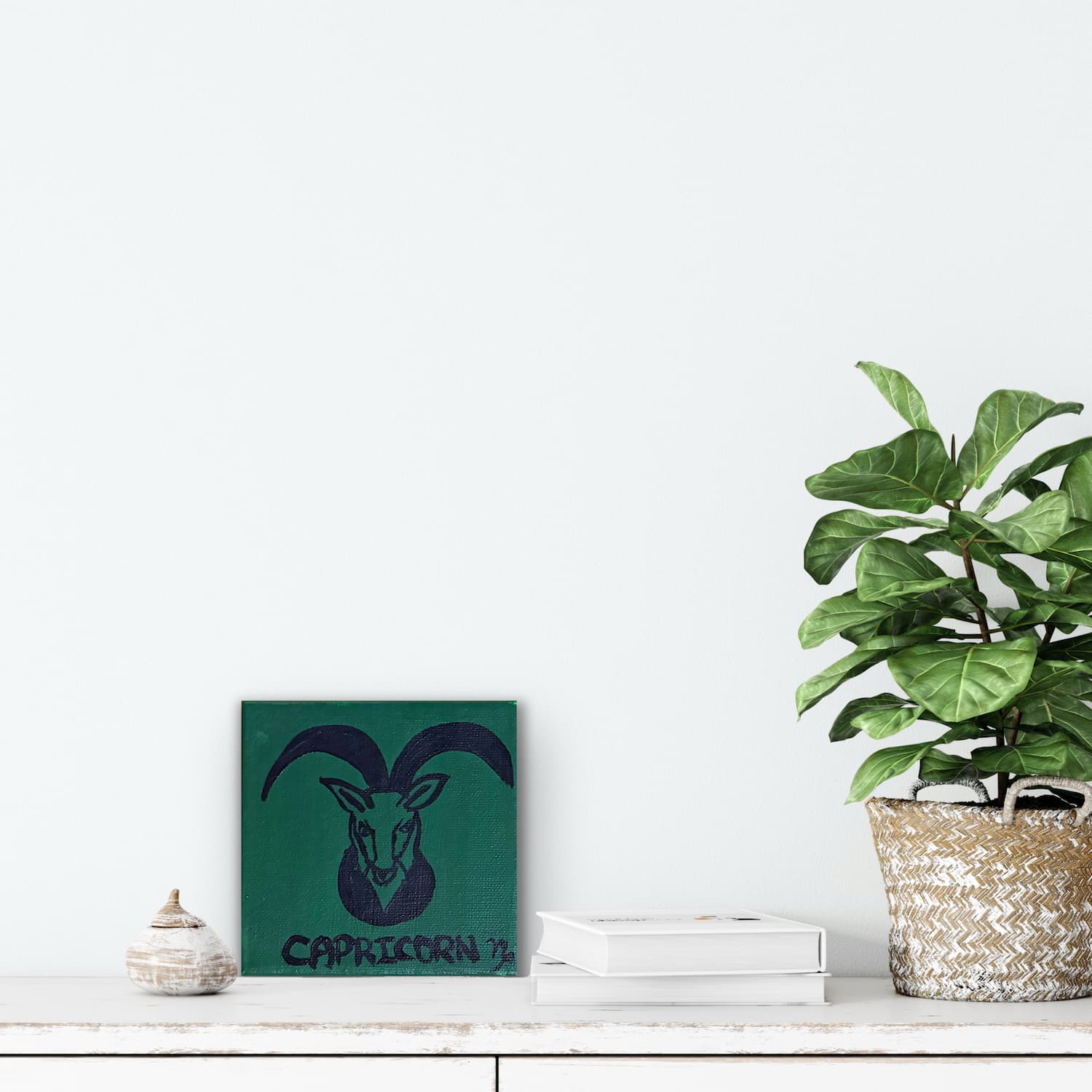 Zodiac of Capricorn mini painting shown mocked up on a wall