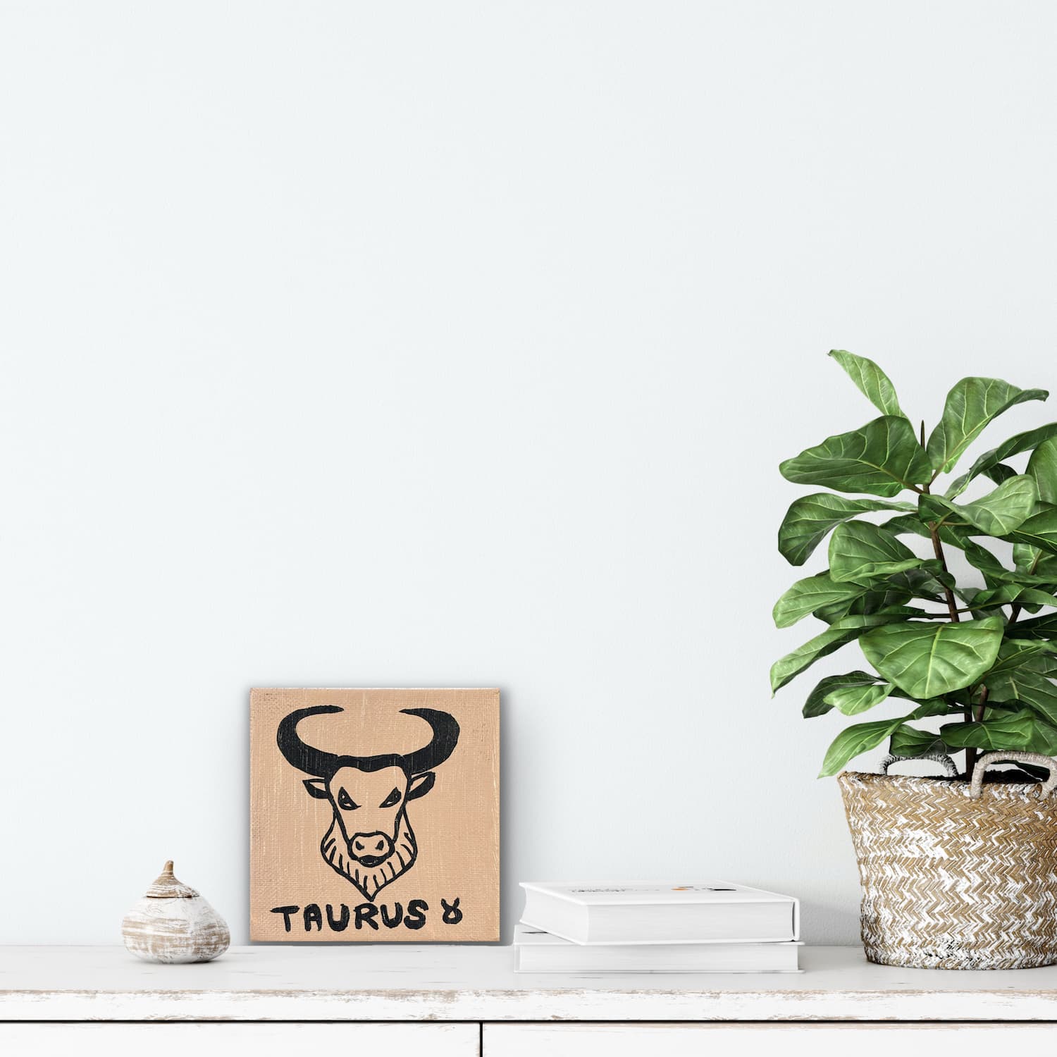 Zodiac of Taurus mini painting shown mocked up on a wall